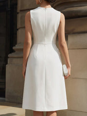 Strukturované midi šaty bez rukávů s kapsami s klopou