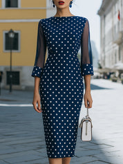 Elegantní tmavě modré puntíkaté midi šaty se síťovanými rukávy