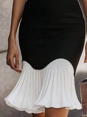 Elegantní černé a bílé midi šaty s vysokým límečkem