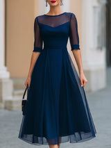 Tmavě modré průsvitné midi šaty střihu fit-and-flare