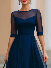 Tmavě modré průsvitné midi šaty střihu fit-and-flare